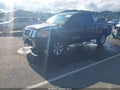 2008 Nissan Titan — photo 2 of 18 | VIN 1N6BA06C98N302745