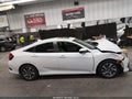 2017 Honda Civic — photo 14 of 17 | VIN 19XFC2F80HE015935