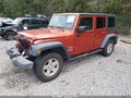 2009 Jeep Wrangler Unlimited — photo 2 of 17 | VIN 1J4GB39119L738675