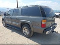 2001 Chevrolet Suburban 1500 — photo 3 of 16 | VIN 1GNFK16T21J244635