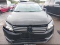 2014 Volkswagen Passat — photo 12 of 16 | VIN 1VWBH7A35EC018581