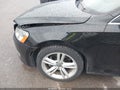 2014 Volkswagen Passat — photo 6 of 16 | VIN 1VWBH7A35EC018581