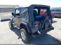2003 Jeep Wrangler — photo 3 of 16 | VIN 1J4FA49S33P307509