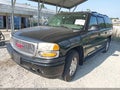 2005 GMC Yukon XL — photo 2 of 10 | VIN 1GKFK66U95J234676