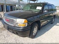2005 GMC Yukon XL — photo 6 of 10 | VIN 1GKFK66U95J234676