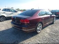 2014 Volkswagen Passat — photo 4 of 19 | VIN 1VWBN7A36EC094948