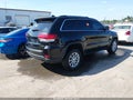 2021 Jeep Grand Cherokee — photo 4 of 11 | VIN 1C4RJFAG4MC666446