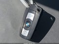 2014 BMW X1 — photo 11 of 11 | VIN WBAVM5C59EVV91435