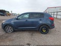 2016 Kia Sportage — photo 14 of 16 | VIN KNDPB3AC2G7867372