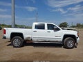 2016 GMC Sierra — photo 14 of 17 | VIN 1GT12TEG4GF163280
