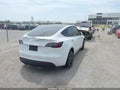 2022 Tesla Model Y — photo 4 of 14 | VIN 7SAYGDEF3NF327071