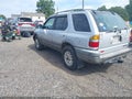 2001 Honda Passport — photo 3 of 17 | VIN 4S6DM58W514401617