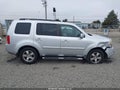 2009 Honda Pilot — photo 13 of 16 | VIN 5FNYF48639B013521