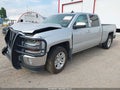 2018 Chevrolet Silverado 1500 — photo 2 of 16 | VIN 1GCUKREC1JF120424