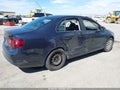 2009 Volkswagen Jetta — photo 4 of 11 | VIN 3VWJM71K39M013754
