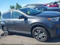 2016 Toyota RAV4 — photo 13 of 16 | VIN JTMZFREV4GJ089476