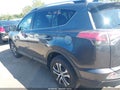 2016 Toyota RAV4 — photo 14 of 16 | VIN JTMZFREV4GJ089476