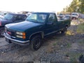1997 GMC Sierra — photo 2 of 14 | VIN 1GTGC24R9VZ507184