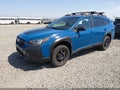 2022 Subaru Outback — photo 2 of 16 | VIN 4S4BTGUD8N3108230