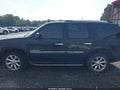 2007 GMC Yukon — photo 14 of 16 | VIN 1GKFK63827J228048