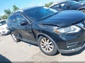 2018 Nissan Rogue — photo 13 of 17 | VIN KNMAT2MV2JP612982