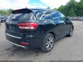 2016 Kia Sorento — photo 4 of 16 | VIN 5XYPKDA11GG041331