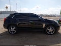2013 Cadillac SRX — photo 13 of 16 | VIN 3GYFNCE35DS622893