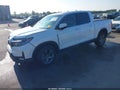 2021 Honda Ridgeline — photo 2 of 17 | VIN 5FPYK3F79MB011340