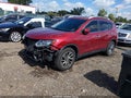 2015 Nissan Rogue — photo 2 of 13 | VIN 5N1AT2MTXFC828054