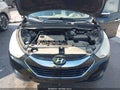 2013 Hyundai Tucson — photo 10 of 10 | VIN KM8JUCAC8DU775479