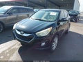 2013 Hyundai Tucson — photo 6 of 10 | VIN KM8JUCAC8DU775479