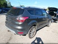 2018 Ford Escape — photo 4 of 16 | VIN 1FMCU0J95JUB82556