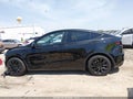 2024 Tesla Model Y — photo 15 of 19 | VIN 7SAYGAEE9RF090680