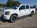 2008 Nissan Titan — photo 2 of 14 | VIN 1N6BA07CX8N321755