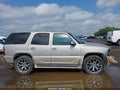 2004 GMC Yukon — photo 13 of 16 | VIN 1GKEK63U94J216614