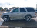 2004 GMC Yukon — photo 14 of 16 | VIN 1GKEK63U94J216614