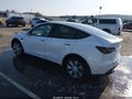 2022 Tesla Model Y — photo 3 of 21 | VIN 7SAYGDEE9NF419261
