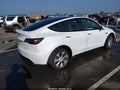 2022 Tesla Model Y — photo 4 of 21 | VIN 7SAYGDEE9NF419261