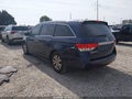 2016 Honda Odyssey — photo 3 of 16 | VIN 5FNRL5H69GB074338