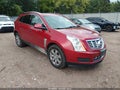 2014 Cadillac SRX — photo 1 of 16 | VIN 3GYFNEE33ES555174