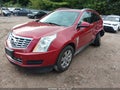 2014 Cadillac SRX — photo 2 of 16 | VIN 3GYFNEE33ES555174