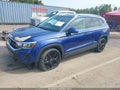2022 Volkswagen Taos — photo 2 of 20 | VIN 3VVLX7B29NM063023