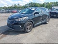 2018 Hyundai Santa Fe — photo 2 of 16 | VIN 5XYZT3LB8JG544304