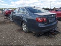 2009 Volkswagen Jetta — photo 3 of 17 | VIN 3VWRM71K49M083508