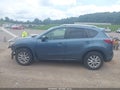 2016 Mazda CX-5 — photo 14 of 16 | VIN JM3KE2CY5G0815657