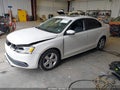 2012 Volkswagen Jetta — photo 2 of 16 | VIN 3VWLL7AJ1CM341037