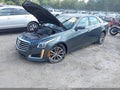 2017 Cadillac CTS — photo 2 of 17 | VIN 1G6AX5SS1H0161743