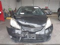 2009 Honda Fit — photo 12 of 16 | VIN JHMGE87449S060743