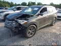 2014 Hyundai Santa Fe — photo 2 of 16 | VIN 5XYZU3LB1EG204494