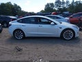 2023 Tesla Model 3 — photo 12 of 17 | VIN 5YJ3E1EA8PF437942